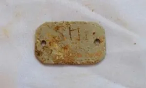 Tìm thấy hài cốt liệt sĩ cùng tấm biển khắc mã 'SH 1-99X'